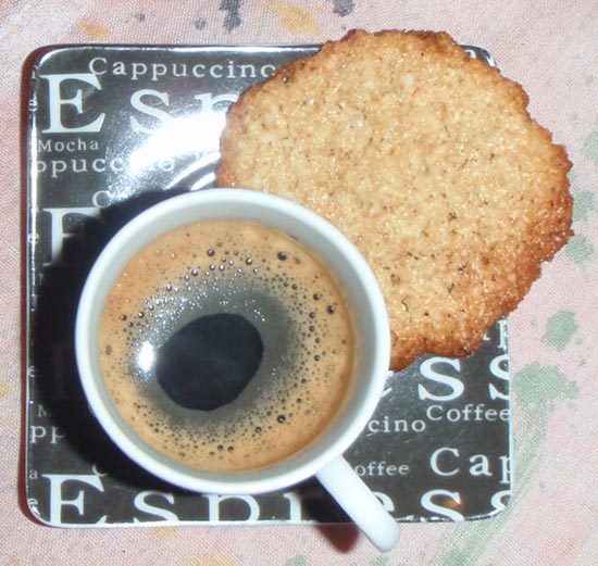 espresso shot and cookie on the side