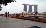 boardwalk bench by the lake with Marina Bay Sands in the backdrop