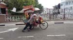 a trishaw driver can be tough on a full load going uphill