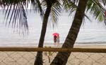 lovers in the rain at Phaidon Beach Resort, Pandan