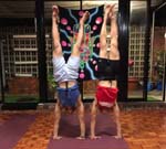handstand with a yoga tri-athlete teacher at Hippie Hub
