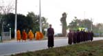 RARE! Theravada monks on the other side of the same street from the Mahayana monks