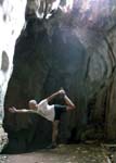 yoga pose in a cave