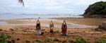 beach yoga with Cheng and Melissa, a resort guest 