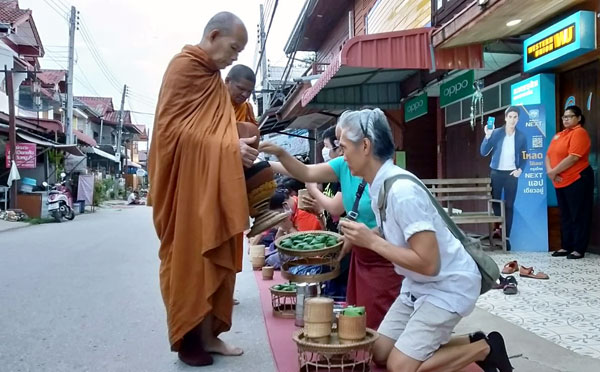 Alms-Round (Sai Bat) with the Buddhist Monks of Chiang Khan